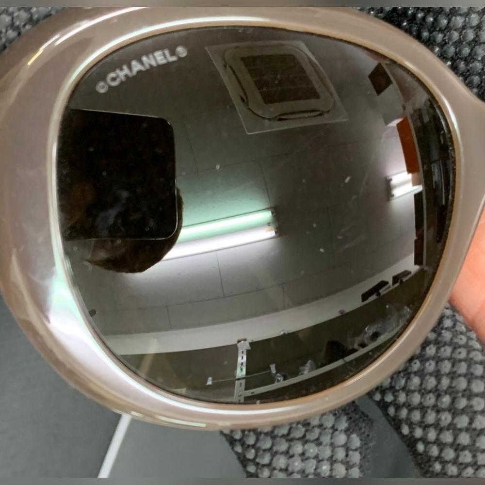 Chanel sunglasses with case.